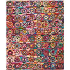 a multicolored rug with circles on it