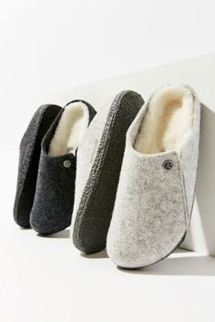 Slip into soft comfort with this Birkenstock clog featuring a shearling footbed and wool felt upper. Complete with an anatomically shaped cork-latex footbed, with an extended shaft, decorative stitching and rivets. Content + Care Wool, shearling, cork, latex Spot clean Imported Size + Fit True to size | Birkenstock Zermatt Wool Clog in Light Grey at Urban Outfitters Birkenstock Zermatt, Birkenstock Slippers, Urban Outfiters, Birkenstock Clog, Birkenstock Clogs, Wool Clogs, Felt Shoes, Fall Wardrobe Essentials, Felted Slippers