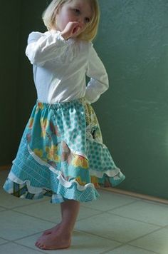 I have had this skirt made for only a few weeks before I listed it, and my daughter has tried to wear it every day!!  Twirling the whole time.This skirt is such a fun skirt for the ULTIMATE Twirl.  When standing in place, it still has the the look like it is twirling.  It's fun, it's new, it's fresh, and it is perfect for Summer!!Comes in size 5-12. I do have a smaller pattern for sizes 1-4, convo me if you would prefer this size.Skirt has 5 or 6 panels that are sewn in, with flounces between ea Cute Tiered Cotton Skirt, Cute Cotton Tiered Skirt, Cute Cotton Pleated Skirt, Playful Blue Cotton Skirt, Playful Cotton Lined Skirt, Playful Lined Skirt, Cute Tiered Lined Skirt, Cute Tiered Skirt With Lining, Cute Tiered Skirt With Elastic Waistband