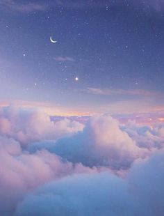 the sky is filled with clouds and stars as the moon shines in the distance