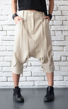 "Casual beige linen pants - METP0030 Very comfortable urban style maxi linen pants with a special accent \"belts\" on the front. They were made by latest fashion trends and can easily be styled with different tops and tunics. The pants are made of linen. Please NOTE that those pants are originally made with a slightly lower waist which is achieved by adding about 4 cm / 1.6 inches to the waistline. EXAMPLE: If you order size L which has a waist of 76 cm / 30 in , the final product will have wais Beige Linen Pants, Summer Linen Pants, Linen Harem Pants, Maxi Pants, Pants Linen, Drop Crotch Pants, Pants Plus Size, Beige Pants, Pants Loose