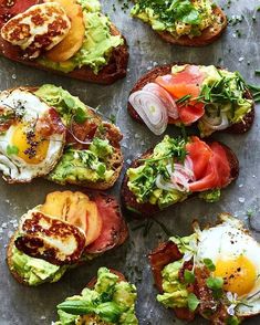 toasted bread topped with avocado, tomatoes and an egg