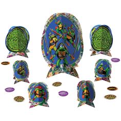 the teenage mutant turtles paper plates and decorations are arranged in a circle on top of each other