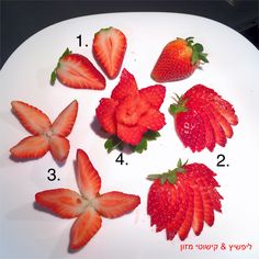 four strawberries arranged on a white plate with numbers