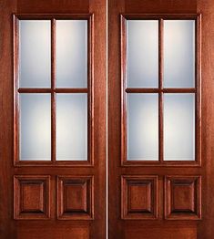 two wooden doors with frosted glass on each side and the same one in front