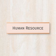 a wooden sign that says human resources on it