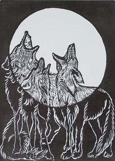 three wolfs standing in front of a full moon