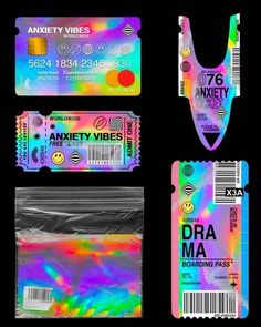 four different types of plastic id cards with rainbow colors and smiley faces on the front