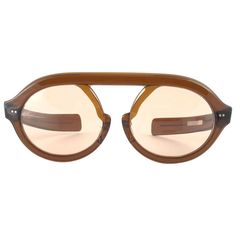 Hardly seen up for sale, " Jardin Dior " this robust frame is a true rarity since its not made from optyl, rather a sample. Lenses are spotless brown. Please notice this item its nearly 60 years old and may show minor sign of wear due to storage. This pair is a must have for a collector! a great opportunity to achieve a unique and yet timeless look Mesurements: Front : 16 cms Lens height : 4.6 cms Lens width : 5.6 cms Unique Eyewear, Fashion Eye Glasses, Stylish Glasses, Dior Sunglasses, Vintage Glasses, Eyewear Design, Eyewear Accessories, Eye Glasses, Designer Sunglasses