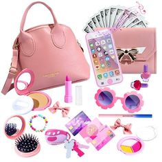 the contents of a pink purse are arranged on a white background, including an iphone and other accessories