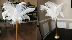 there are two tall vases with white feathers on them and one has gold legs