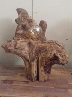 a piece of wood with a clock on it