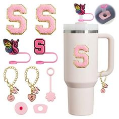 pink and white coffee cup with numbers, keychains, clippers and other accessories