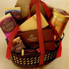 a basket filled with assorted chocolates and candy