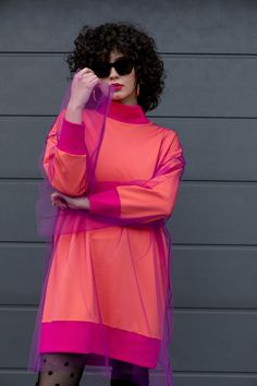 🍒 Unique oversized avant garde loose fit winter dress for Fall Winter Season cut in a lovely cotton sweatshirt fabric, decorated with separate tulle dress above. The color combination in coral, pink and purple gives this long sleeve sweater dress fresh, chic and unique look! Style it with moto boots, over the knee boots or sneakers. 🍒 Color: Coral, Pink and Purple  🍒 Length : 90 cm / 35.5 in  🍒 Fabric : Cotton Sweatshirt Fabric and Tulle  🍒 Please take a look at our size chart to ensure per Avant Garde Gown, Weird Fashion Outfits, Pink And Purple Dress, Sweater Dress Fall, Tulle Fashion, Oversized Black Sweater, Colour Blocking Fashion, Quilt Dress, Sweater Dress Oversized