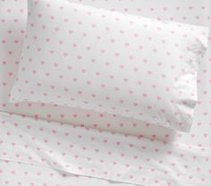 pink hearts on white sheet set with matching pillow cases and duvet covers in the same pattern