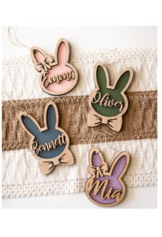 three wooden magnets with the words bunny, me and eevee on them