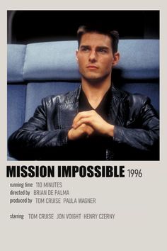 the poster for mission impossible is displayed in front of a man's face with his arms crossed