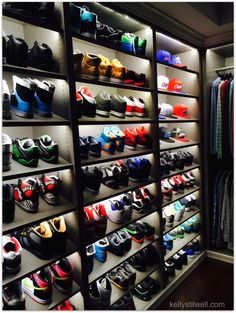 there are many pairs of shoes on the shelves