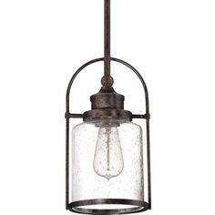 an old fashioned light fixture with a glass jar hanging from it's side, on a white background