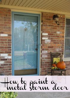 a blue front door with the words how to paint a metal storm door