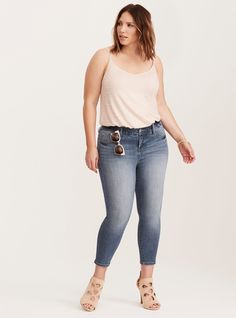 <div><div>Baby, you're a bombshell and now we've got the jeans to back you up. Made with our medium wash Premium Stretch denim - tons of stretch with extra recovery - the fit is all skinny from thigh to shoe-baring cropped ankle. The rearview, however, has been expertly constructed to lift, enhance and shape your curves, transforming your booty like never before.</div><div><ul><li style="list-style-position: inside !important; list-style... Women's Plus Size Jeans, Most Comfortable Jeans, New Street Style, Active Outfits, Swimming Outfit, Plus Size Womens Clothing, Bra And Panty Sets, Plus Size Jeans, High Rise Jeans