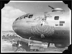 an old airplane is parked on the tarmac