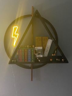 a book shelf with books and a neon sign on the wall above it that says lightning