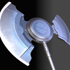 an image of a large metal object with a long blade in it's center