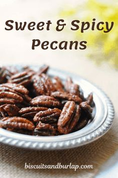 a plate full of pecans sitting on a table