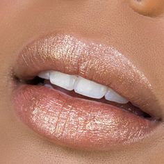 Our multi-effective glitter formula delivers a high-pigmented, lightweight, sparkle finish, while still keeping your lips feeling nourished. Our Diamond Shine Lipstick never leaves your lips feeling dry, and even has a delightful light peach smell. As a shining nude lipstick, it can be worn by itself or over your favorite matte lipstick for a dramatic, full colored effect. This Diamond Shine Shining Nude features Vitamin E to keep your lips moisturized. Each unique and trendy shade is made with Light Peach Lipstick, Nude Pink Lipstick, Gradient Lips, Shimmer Lipstick, Shiny Lipstick, Peach Lipstick, Orange Lipstick, Metallic Lipstick, Glitter Lipstick