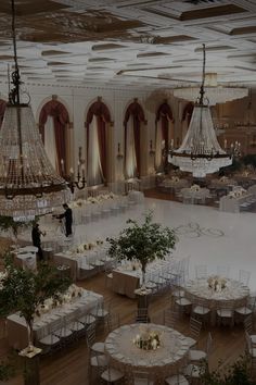 an overhead view of a ballroom with chandeliers and tables set up for a formal function