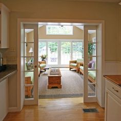 an open door leading into a living room