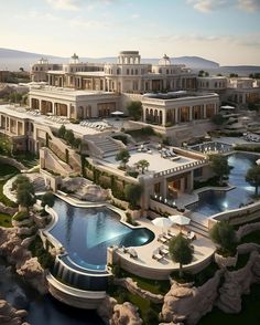 an aerial view of a mansion with a swimming pool