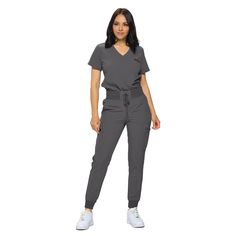 PRICES MAY VARY. PETITE AND REGULAR SIZING- Fit is important, go with Monarch scrub sets for the size that fits YOU. Refer to our size chart for the perfect fit scrubs! PREMIUM STRETCH- Our Poly/Spandex blend scrub set is crafted from a high-quality blend of stretch fabric, ensuring durability, flexibility, and all-day comfort. TUCK-IN SCRUB TOP- Keep it simple and clean with this one pocket tuckable top for a modern, professional look. MODERN RELAXED FIT JOGGER PANTS- Featuring a soft-ribbed wa Gray Scrubs Outfit, Scrub Pants Outfit, Scrub Fashion, Scrubs Uniform Cute, Scrub Outfits, Nurse Vibes, Jogger Scrubs, Nurse Outfit Scrubs, Nurse Outfit