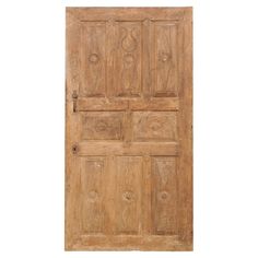 an old wooden door with carvings on it