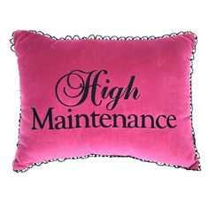 a pink pillow with the words high maintenance on it and black writing in black ink