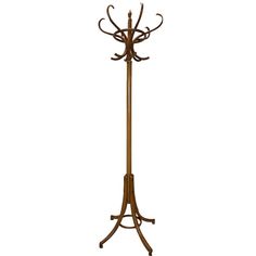 a coat rack with three hooks on it