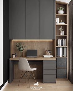 a home office with gray cabinets and wooden flooring