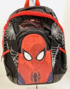 MARVEL The Ultimate Spiderman 16" Super Hero Backpack School Bag~Book Bag This awesome Ultimate Spiderman backpack is a pack that your child can easily carry books, gym clothes, pencils, and more! The day pack features a roomy main compartment and side mesh pockets with webbing detail. The book bag can be hung up when not in use by the webbed locker loop. Bring your favorite superhero back to school! Features   Multiple compartments to keep things organized Well constructed and comfortable Fun a The Ultimate Spiderman, Spiderman Backpack, Web Detail, Deco Salon, Ultimate Spiderman, Backpack School, Gym Clothes, School Bags For Kids, Geek Culture