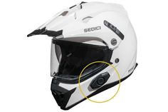 the side view of a white helmet with black accents