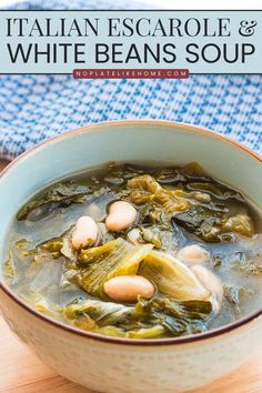 a bowl filled with white beans soup on top of a wooden table