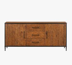 the sideboard is made out of wood and has two drawers, one with metal handles