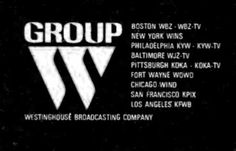 the group logo is shown in this black and white photo, with words above it