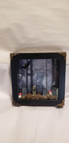 an image of halloween scene in a frame