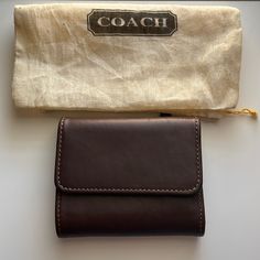 Vintage Coach Wallet In Excellent Condition Measurements In Pictures Coach Bifold Coin Purse Gift, Compact Coach Wallet For Travel, Compact Travel Wallet By Coach, Elegant Trifold Bag As A Gift, Classic Coach Coin Purse With Coin Pocket, Coach Rectangular Brown Coin Purse, Brown Rectangular Coach Coin Purse, Coach Wallet With Coin Pocket As Gift, Coach Wallet With Coin Pocket For Gift