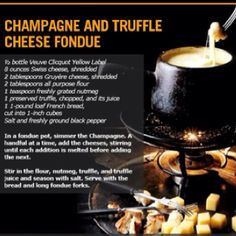 an advertisement for champagne and truffle cheese fondue on a black plate with silverware