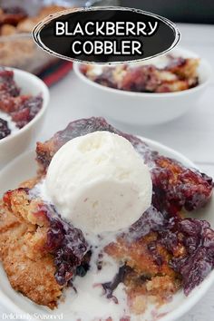 a plate with some fruit cobbler and ice cream on top in front of other plates