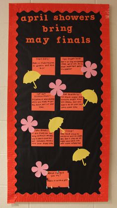 a bulletin board with flowers and umbrellas on it that says, spring showers bring may finds