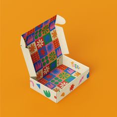 an origami chair made out of brightly colored paper